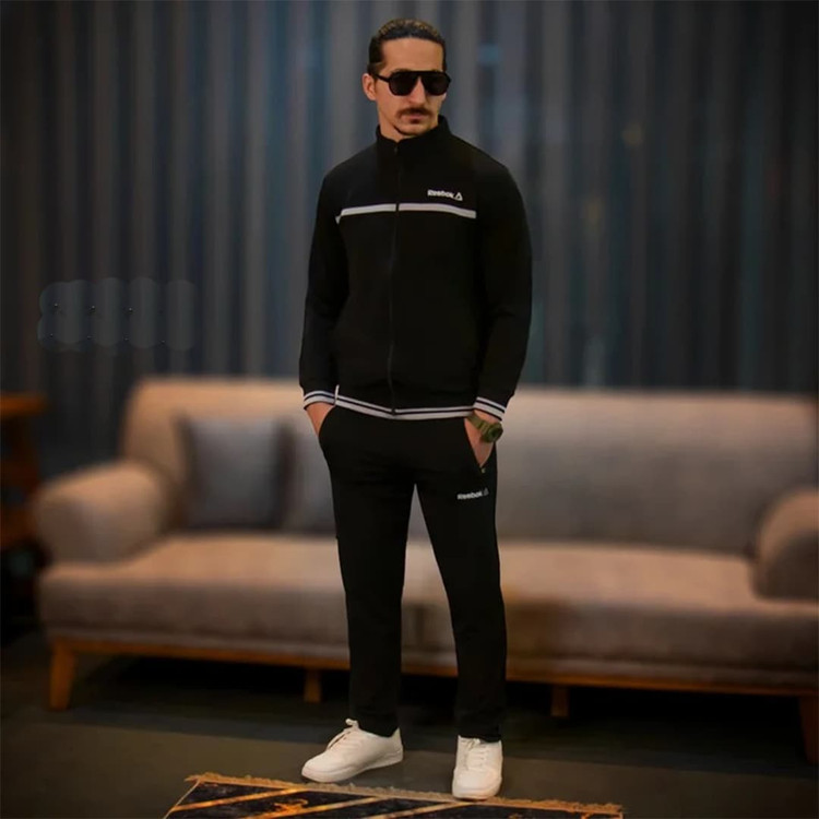 ست ورزشی مردانه ریبوک رنگ مشکی با نوار طوسی گرمکن و شلوار اسپرت Reebok